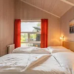 Casa vacanze 6 Personen In Direkter Seelage Mit Bootsteg Und Kanu Sowie Sauna, Whirlpool Und Kaminofen In *