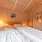6 Personen In Direkter Seelage Mit Bootsteg Und Kanu Sowie Sauna, Whirlpool Und Kaminofen In Otterndorf