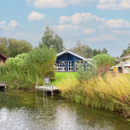 Prázdninový dům 6 Personen In Direkter Seelage Mit Bootsteg Und Kanu Sowie Sauna, Whirlpool Und Kaminofen In *