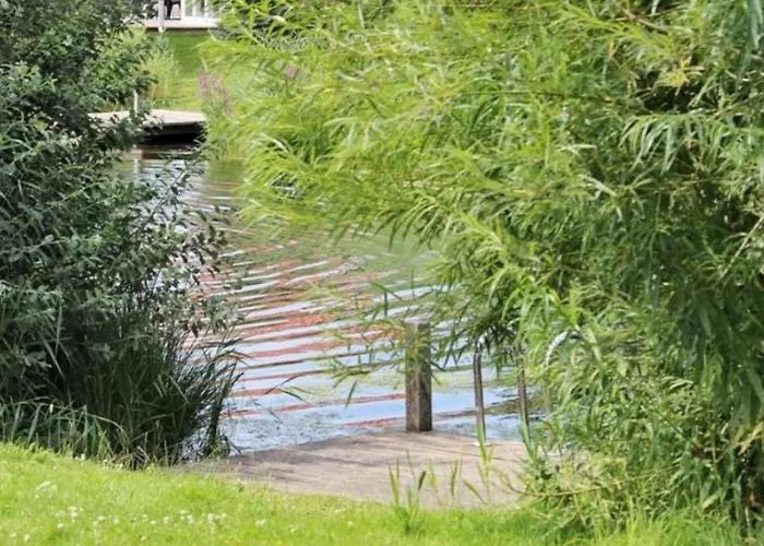 6 Personen In Direkter Seelage Mit Bootsteg Und Kanu Sowie Sauna, Whirlpool Und Kaminofen In 度假居 奥滕多夫